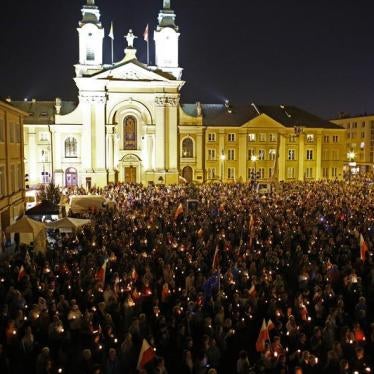 People gather in front of the Supreme Court during a protest against the Supreme Court legislation in Warsaw, Poland, July 2, 2017.