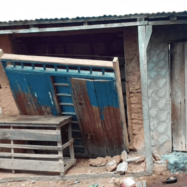 A Mozambican army soldier inspects a building destroyed during a night attack by a suspected armed Islamist group in Chicuaia Velha village, Nangade district, on November 23, 2018.  © 2018 Alexandre Zerinho