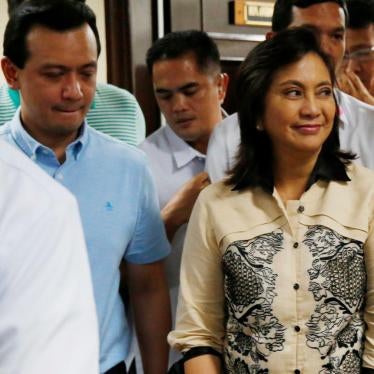 Sen. Antonio Trillanes IV, second left, escorts Vice President Leni Robredo, right, who visited him at the Philippine Senate Thursday, Sept. 6, 2018 in suburban Pasay city, south of Manila, Philippines. 