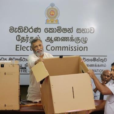Sri Lanka's elections chief Mahinda Deshapriya displays ballot boxes that will be used in the upcoming presidential election in Colombo, Sri Lanka, Thursday, Oct. 31, 2019. The voting is scheduled to be held on Nov. 16. 