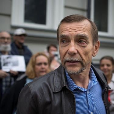 Russian human rights activist Lev Ponomarev speaks to the media at the For Human Rights movement headquarters in Moscow, Russia