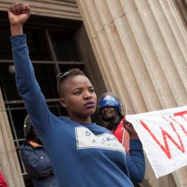 Students in front of Wits great hall protesting against the militarized securities in Wits, from the film Everything Must Fall