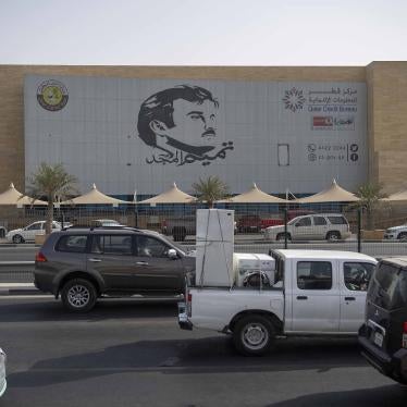 An image of the Emir Sheikh Tamim bin Hamad Al Thani on a building in Doha, Qatar.