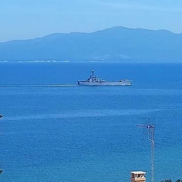 Greek naval vessel holding newly arrived asylum seekers and migrants, shortly after departing Mytilene harbor, March 14, 2020.