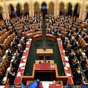 Hungarian Prime Minister Viktor Orban, center right, speaks during a plenary session in the House of Parliament in Budapest, Hungary, Monday, March 23, 2020.